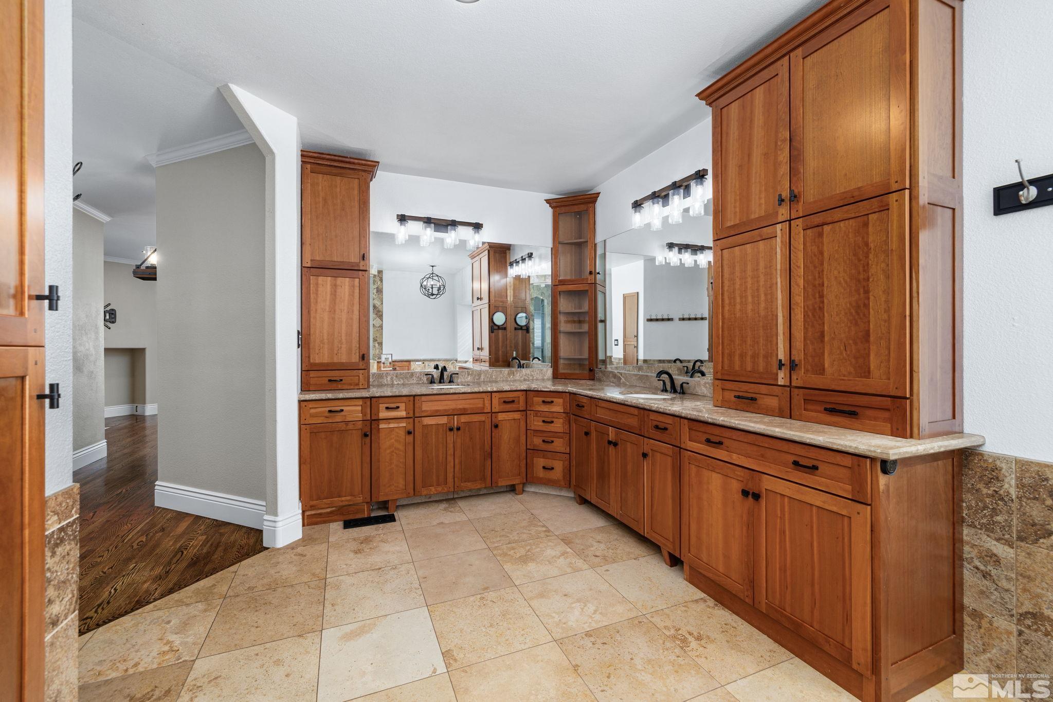 12595 Water Lily Way Reno, NV 89511 - Photo 20 of 36 a large kitchen with a sink and refrigerator