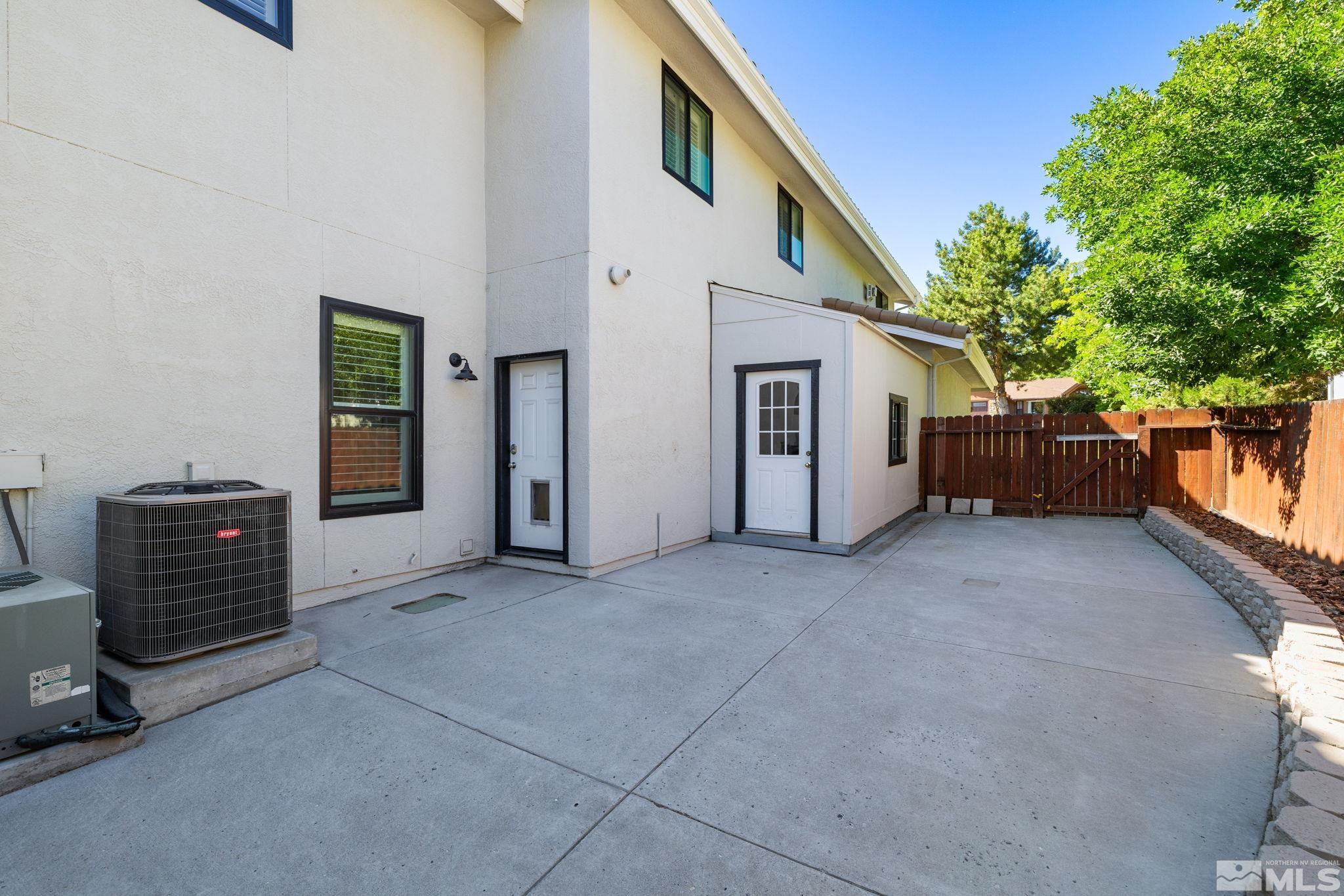 12595 Water Lily Way Reno, NV 89511 - Photo 35 of 36 a view of a house with a garage