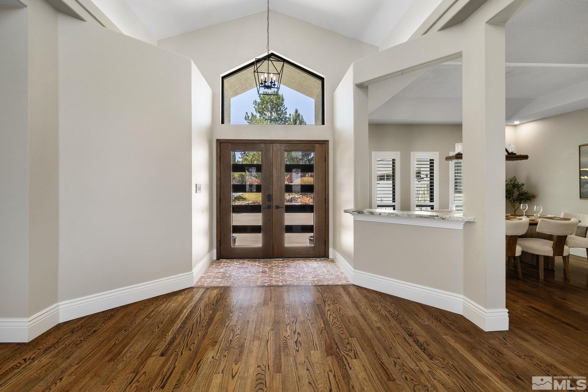 12595 Water Lily Way Reno, NV 89511 - Photo 5 of 36 wooden floor in a room with a window
