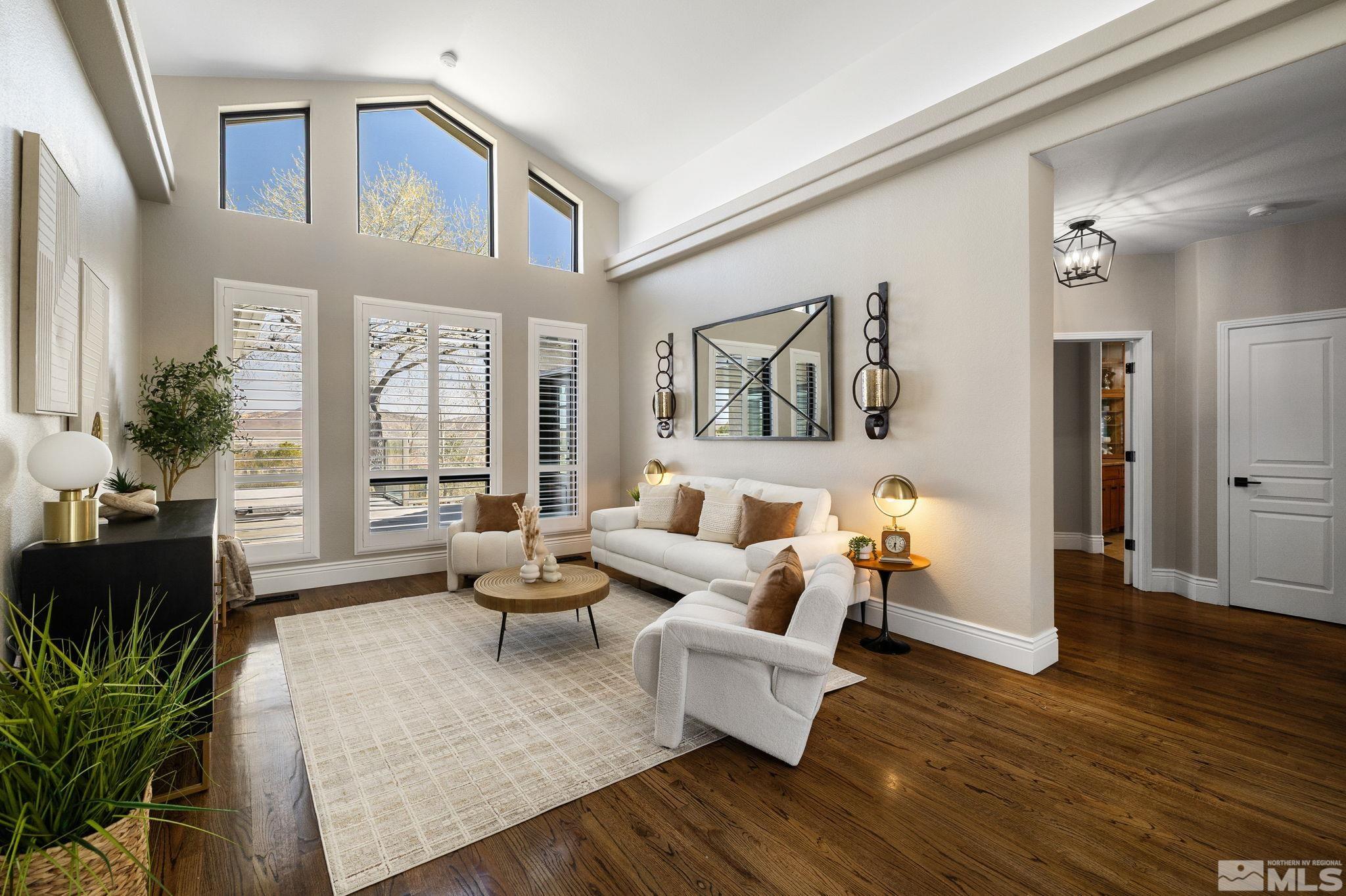 12595 Water Lily Way Reno, NV 89511 - Photo 6 of 36 a living room with furniture and wooden floor