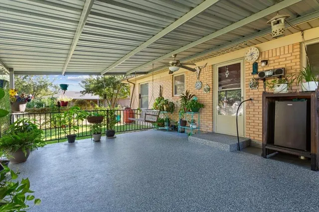 a view of a porch with furniture