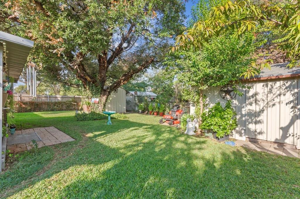 6209 May Drive Waco, TX 76710 - Photo 25 of 30 Fenced backyard with a storage unit
