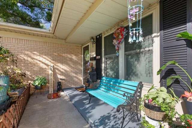 a view of path along with house and outdoor seating