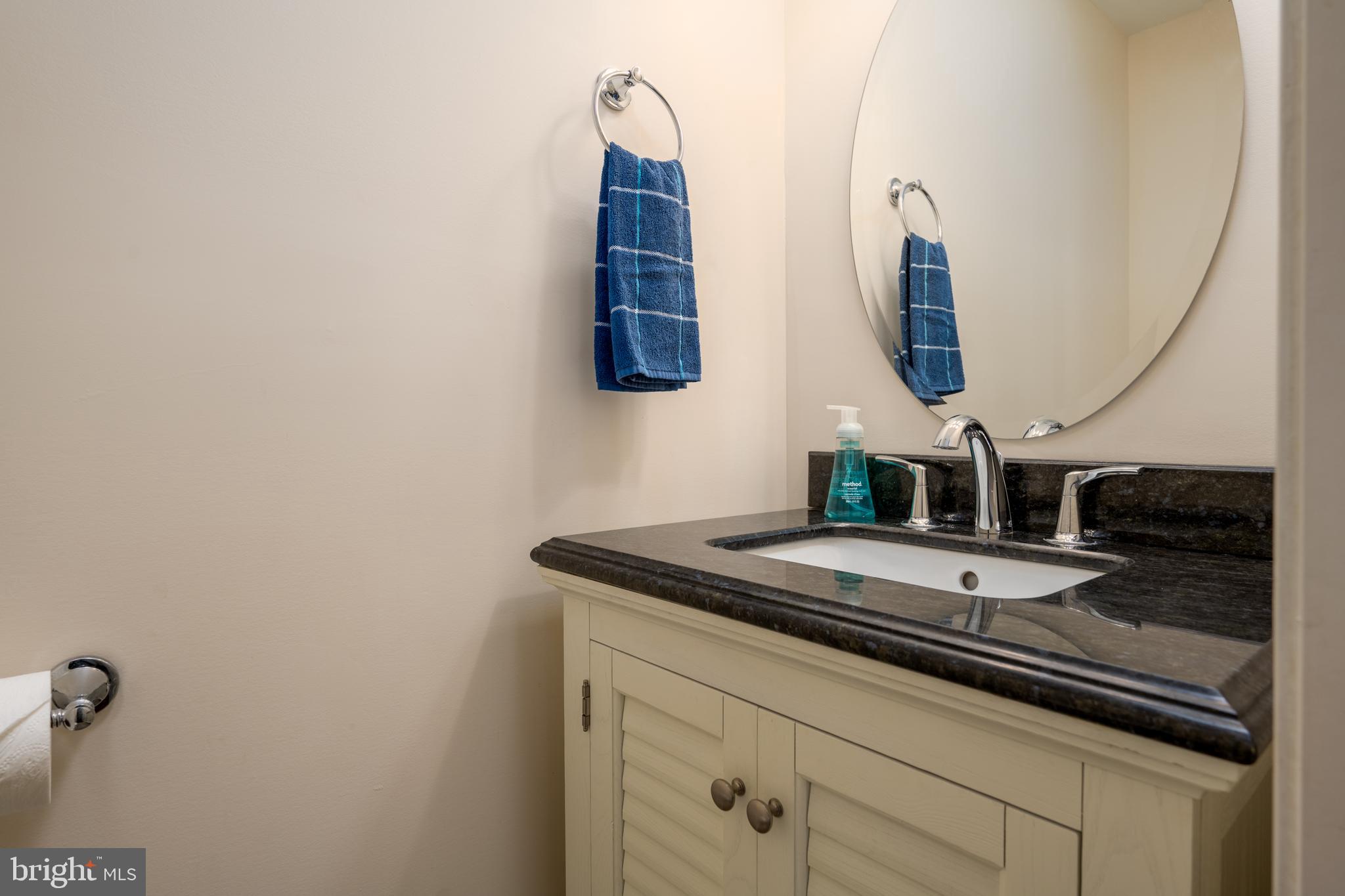722 Anchor Chain Road, Unit 15B Ocean City, MD 21842 - Photo 15 of 26 Half bathroom near kitchen