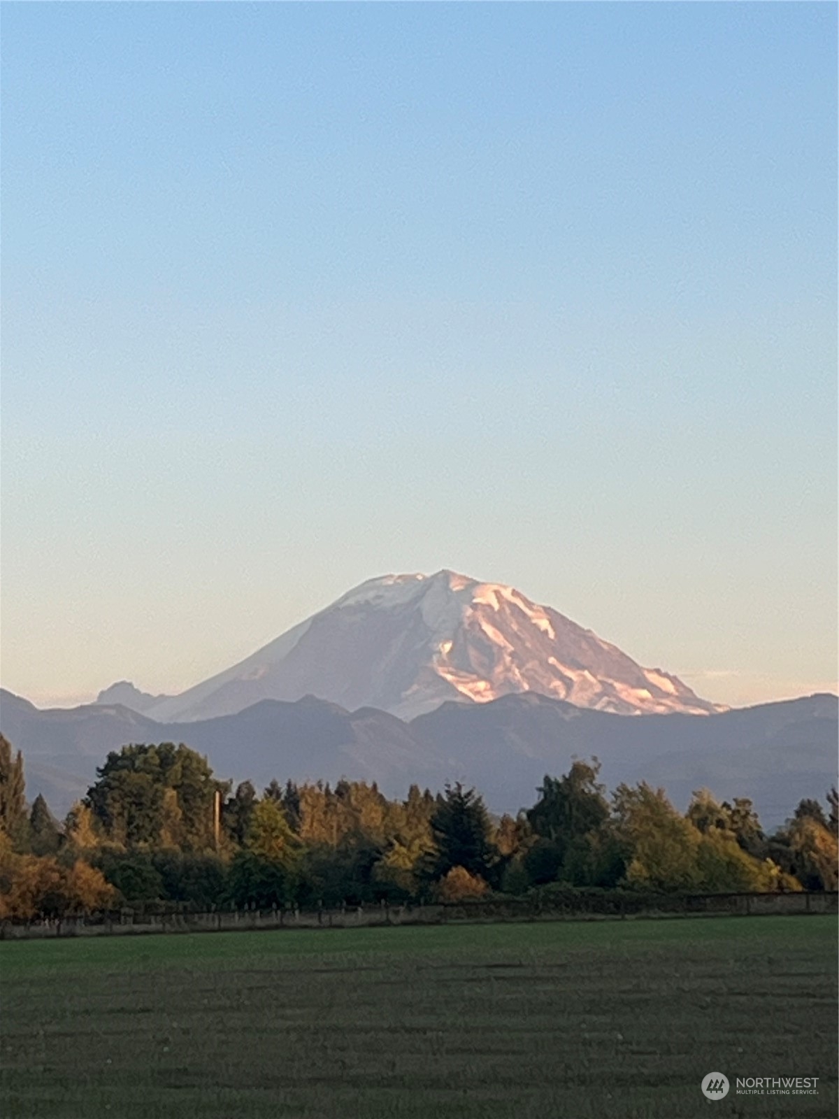 40980 228th Avenue Southeast Enumclaw, WA 98022 - Photo 30 of 32 a view of a town with mountains in the background