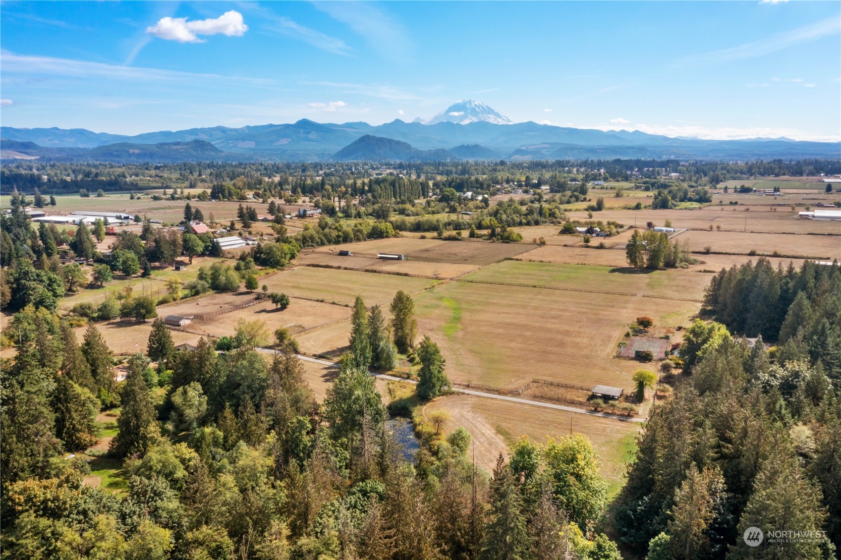 40980 228th Avenue Southeast Enumclaw, WA 98022 - Photo 32 of 32 a view of a lake and mountain
