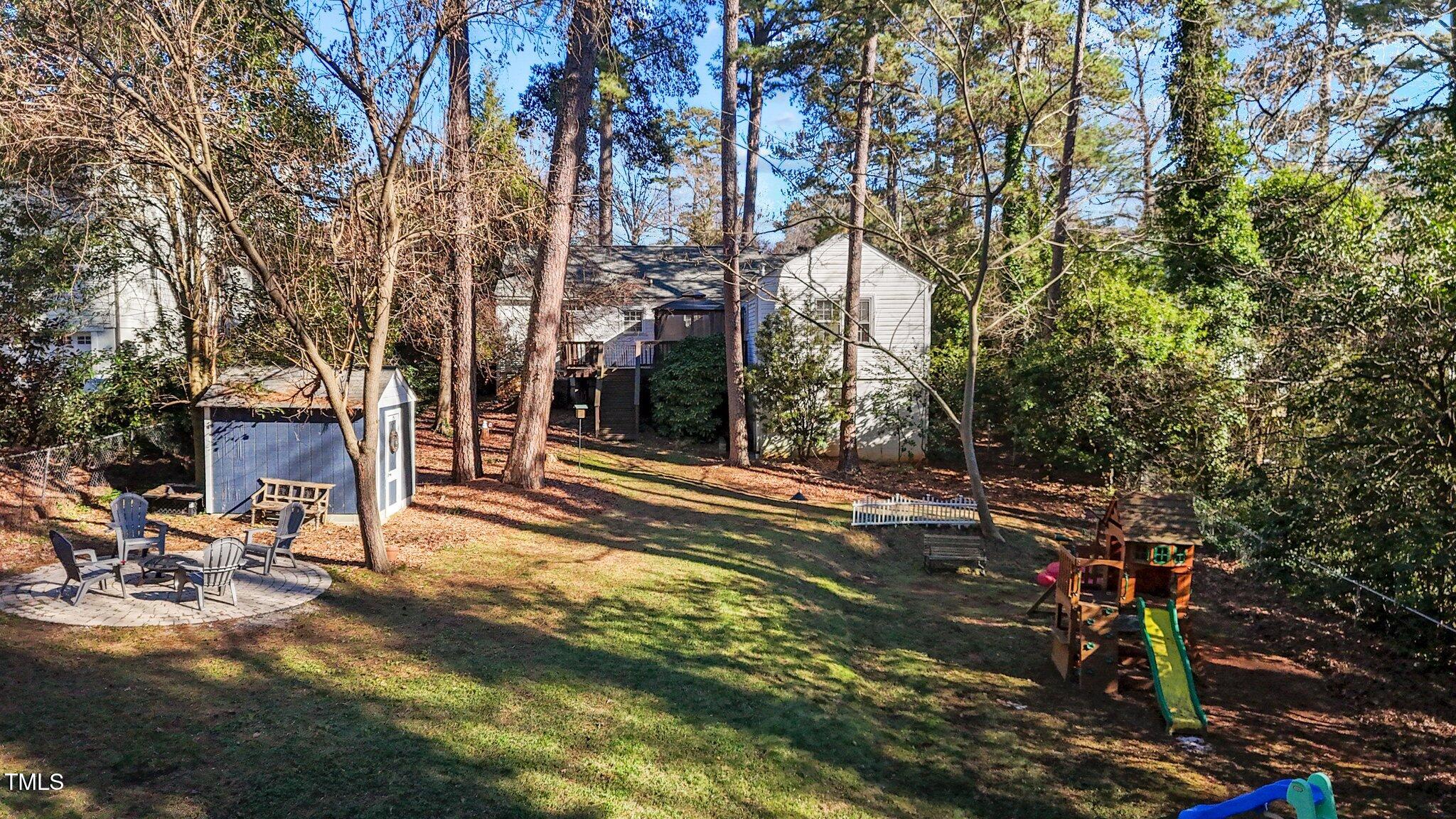 1325 Duplin Road Raleigh, NC 27607 - Photo 33 of 46 Nice backyard with a Shed. Extensive yardwork done for play equipment and a more pleasant space.