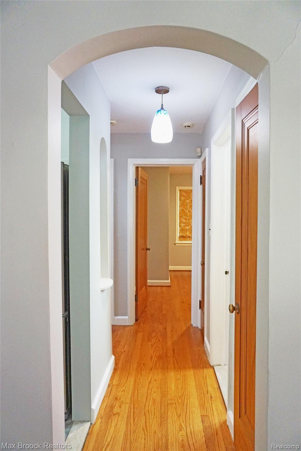 451 Cloverly Road Grosse Pointe, MI 48236 - Photo 12 of 31 Light and Bright Hallway leads you to the Bedrooms