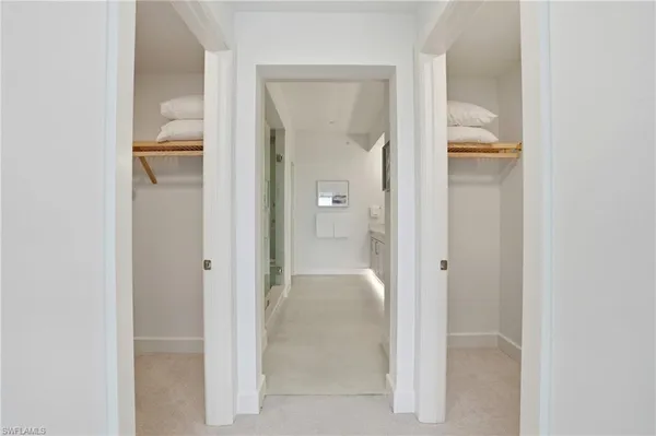 a bathroom with a double vanity sink mirror and