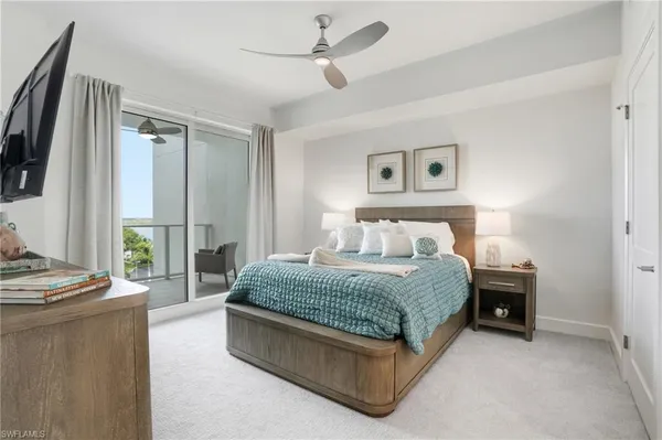 a bedroom with a bed and a walk in closet
