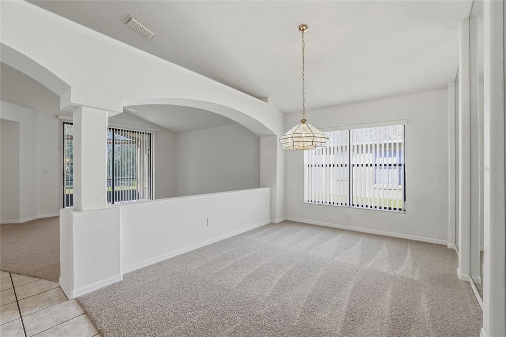 6935 Freeport Road Riverview, FL 33578 - Photo 16 of 51 a view of empty room with windows
