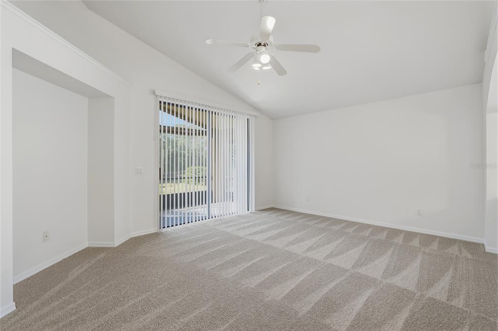 6935 Freeport Road Riverview, FL 33578 - Photo 18 of 51 a view of an empty room with a window
