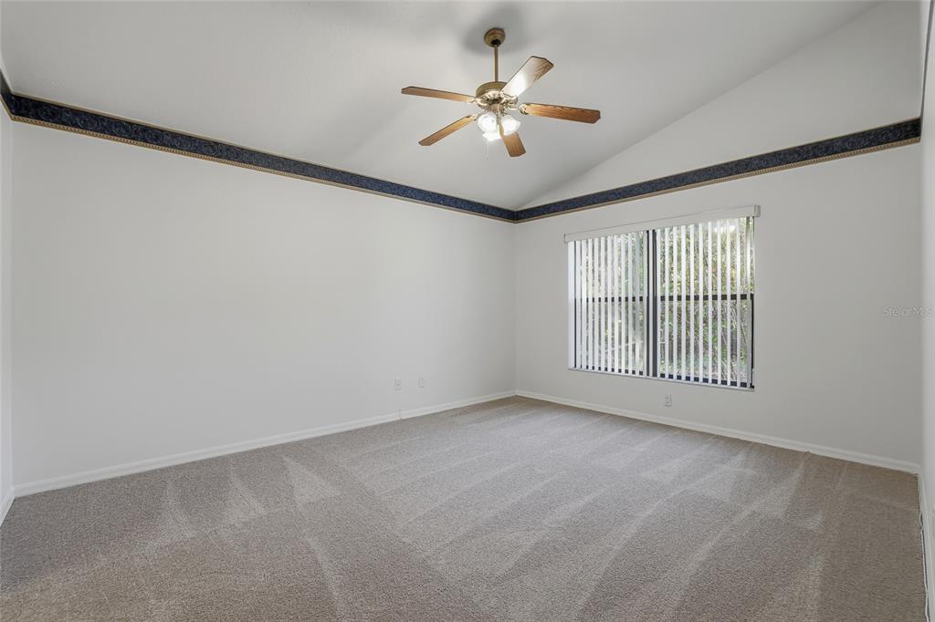 6935 Freeport Road Riverview, FL 33578 - Photo 24 of 51 a view of an empty room with a window