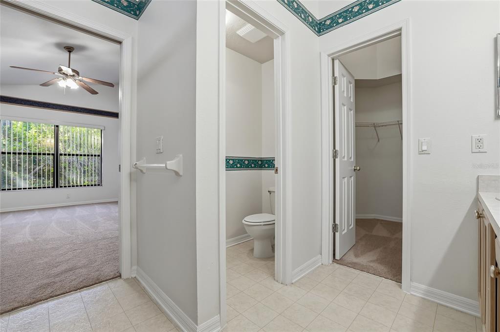 6935 Freeport Road Riverview, FL 33578 - Photo 31 of 51 view of a bathroom with a glass door shower and a sink