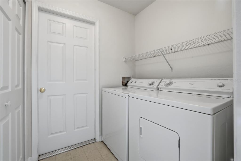 6935 Freeport Road Riverview, FL 33578 - Photo 38 of 51 a utility room with dryer and washer