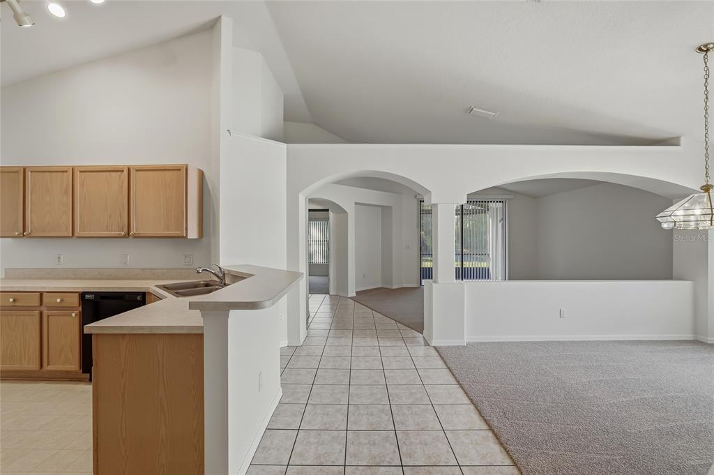 6935 Freeport Road Riverview, FL 33578 - Photo 7 of 51 a view of a hallway with washer and dryer