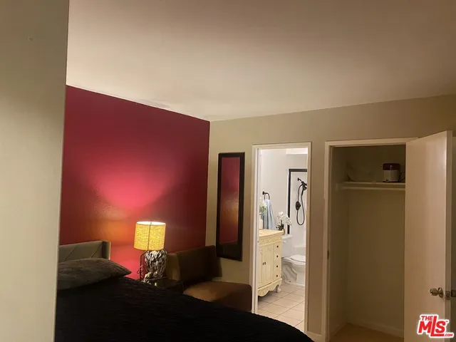 a view of empty room with a fireplace