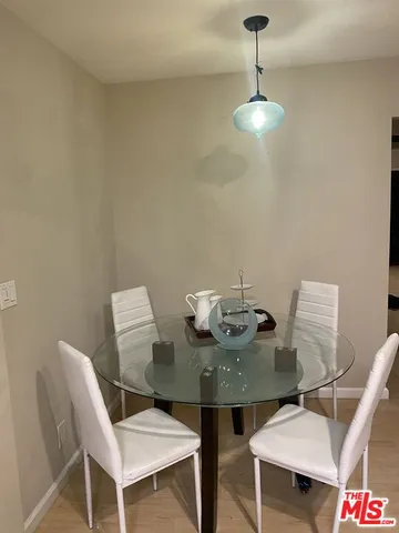a view of a dining room with furniture