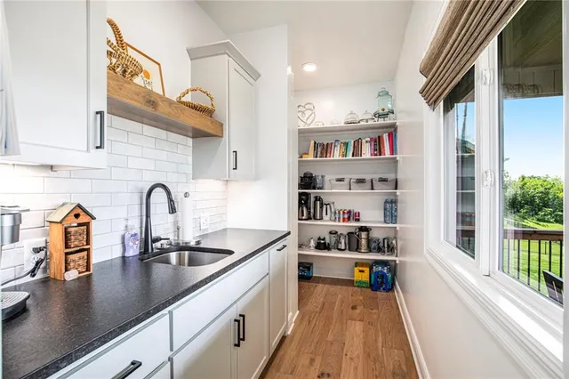 $895,000 | 130 Northwest Ambersham Drive, Lee's Summit, MO 64081