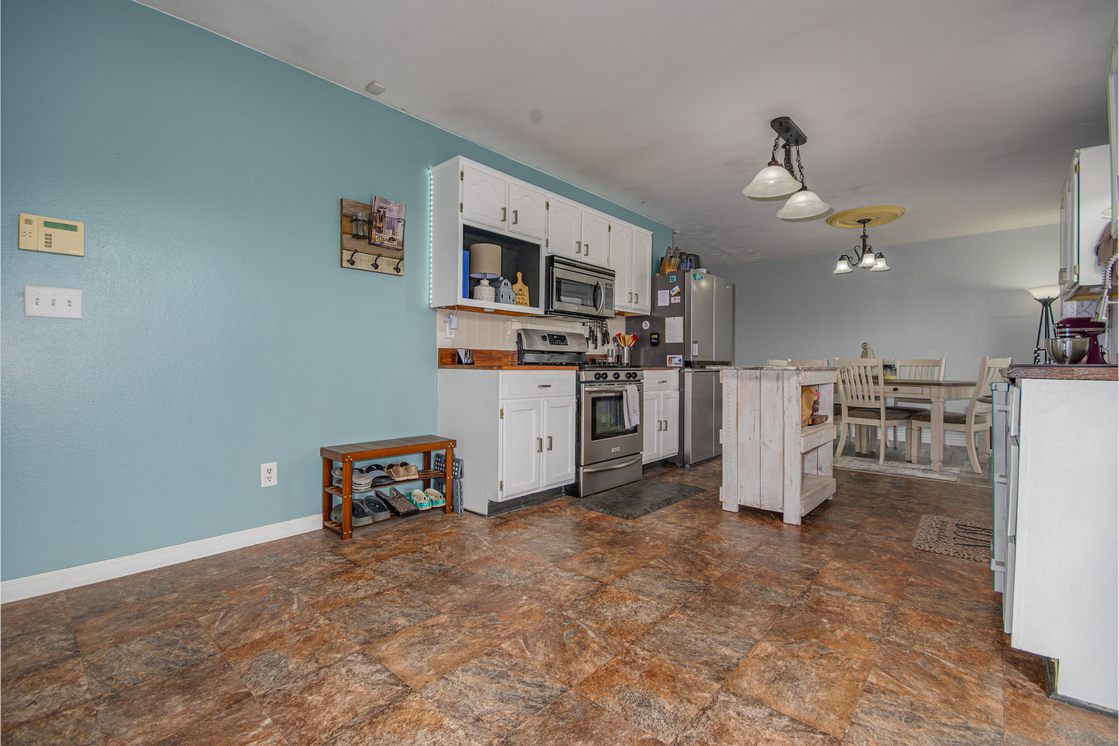 4786 Keller Road Iuka, IL 62849 - Photo 13 of 40 a living room with furniture and a flat screen tv