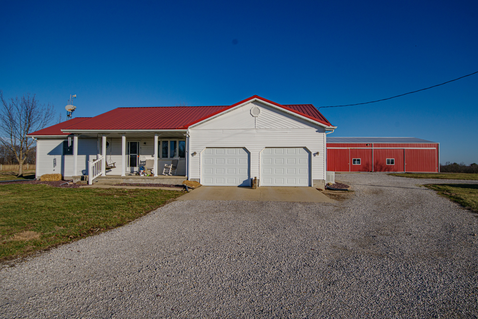 4786 Keller Road Iuka, IL 62849 - Photo 34 of 40 a front view of a house with a yard and garage
