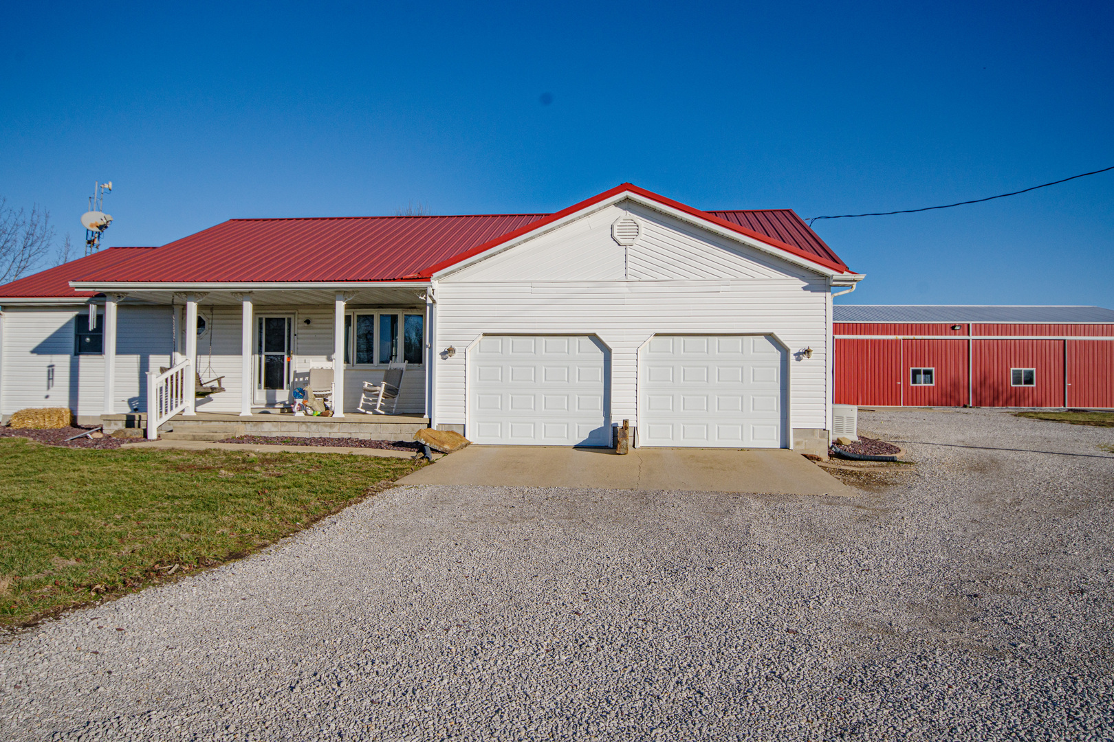 4786 Keller Road Iuka, IL 62849 - Photo 5 of 40 a front view of a house with a yard and garage