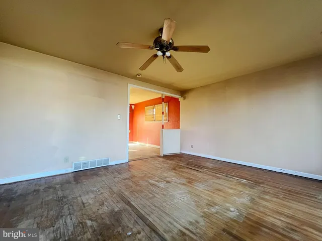 a view of an empty room and window