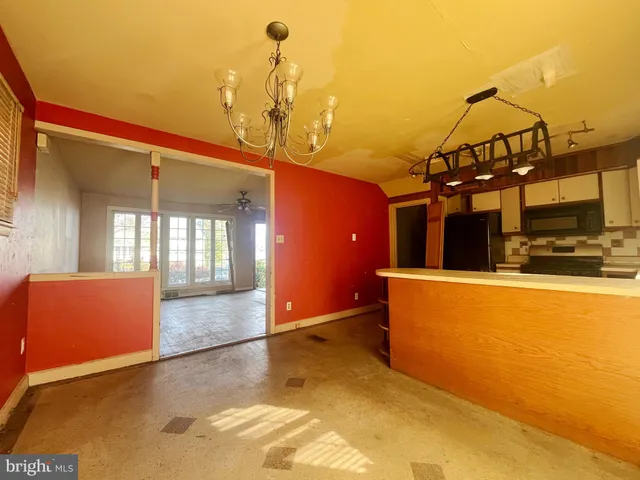 a view of a living room and bathroom