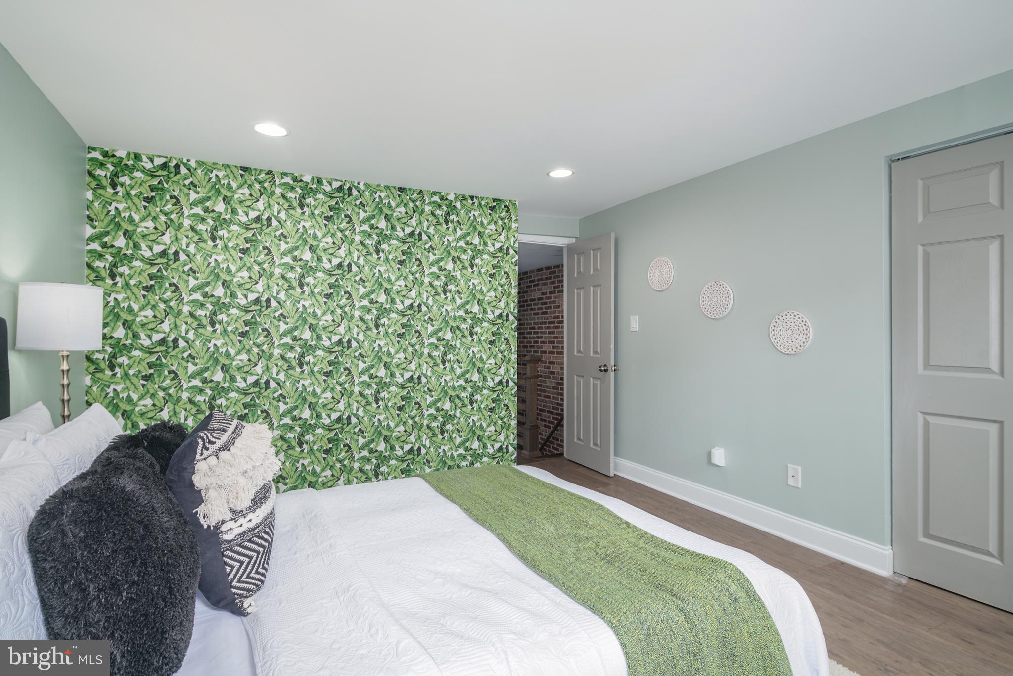 1443 East Oxford Street Philadelphia, PA 19125 - Photo 15 of 28 a bedroom with a bed and a shower