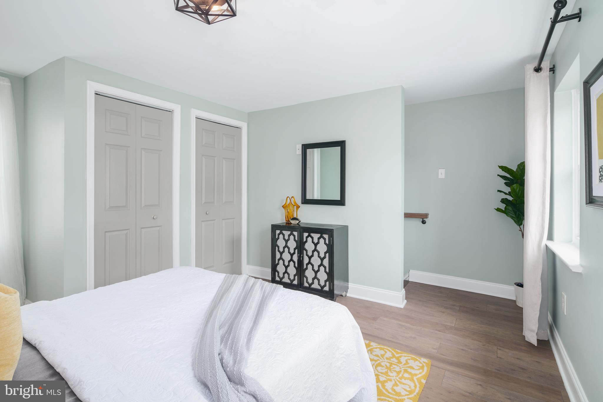 1443 East Oxford Street Philadelphia, PA 19125 - Photo 20 of 28 a bedroom with a bed and a dresser