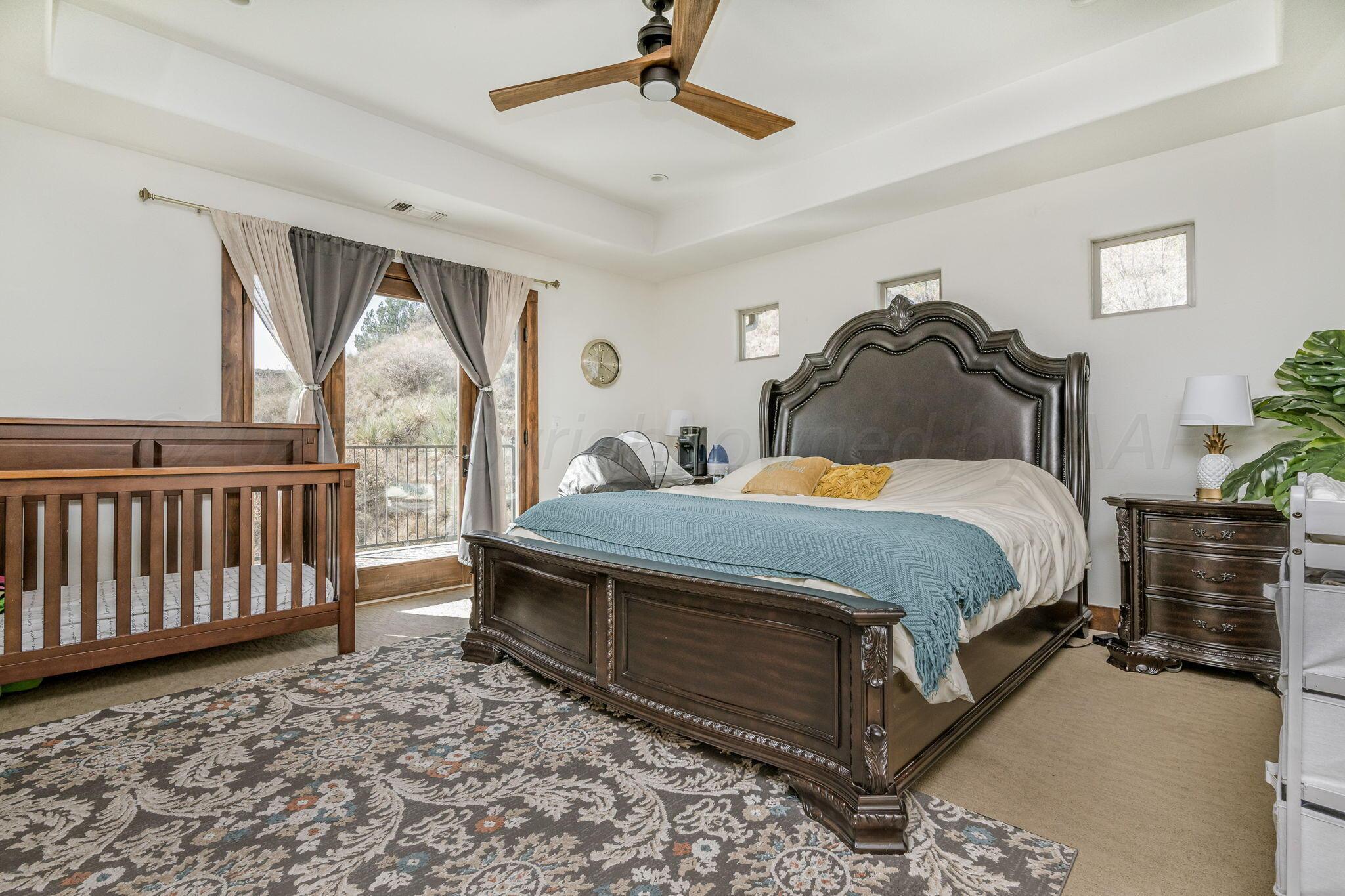 101 Pheasant Run Canyon, TX 79015 - Photo 26 of 39 a bedroom with a bed and a window