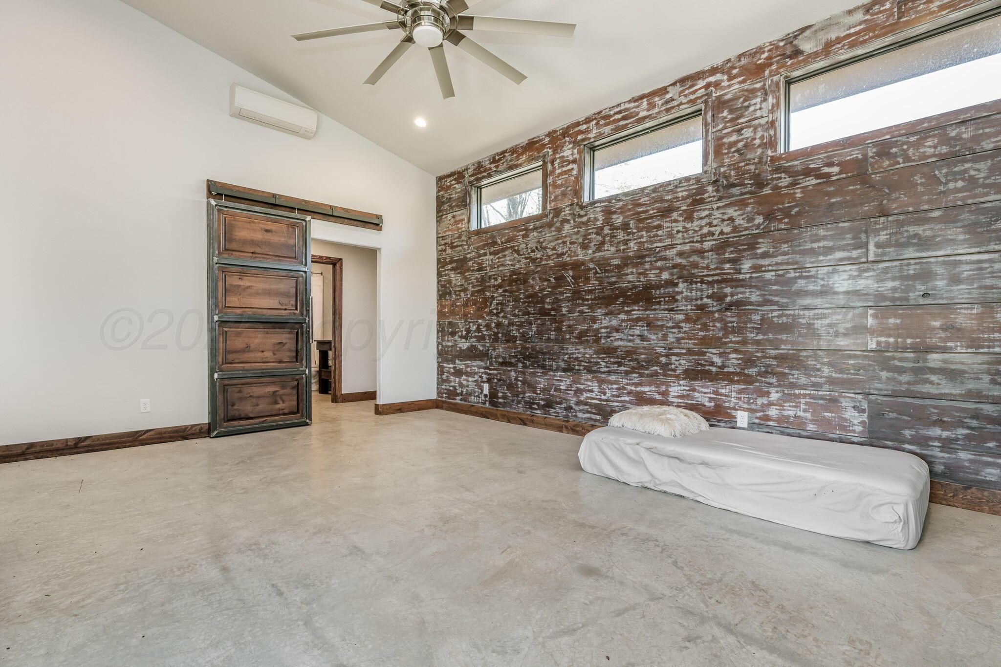 101 Pheasant Run Canyon, TX 79015 - Photo 32 of 39 wooden floor in an empty room