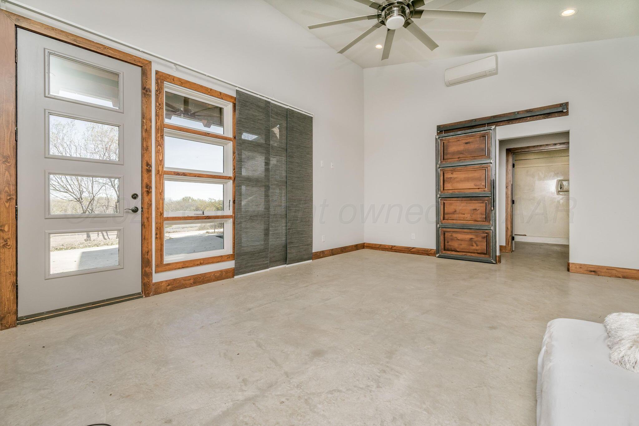101 Pheasant Run Canyon, TX 79015 - Photo 33 of 39 a view of an empty room with a window