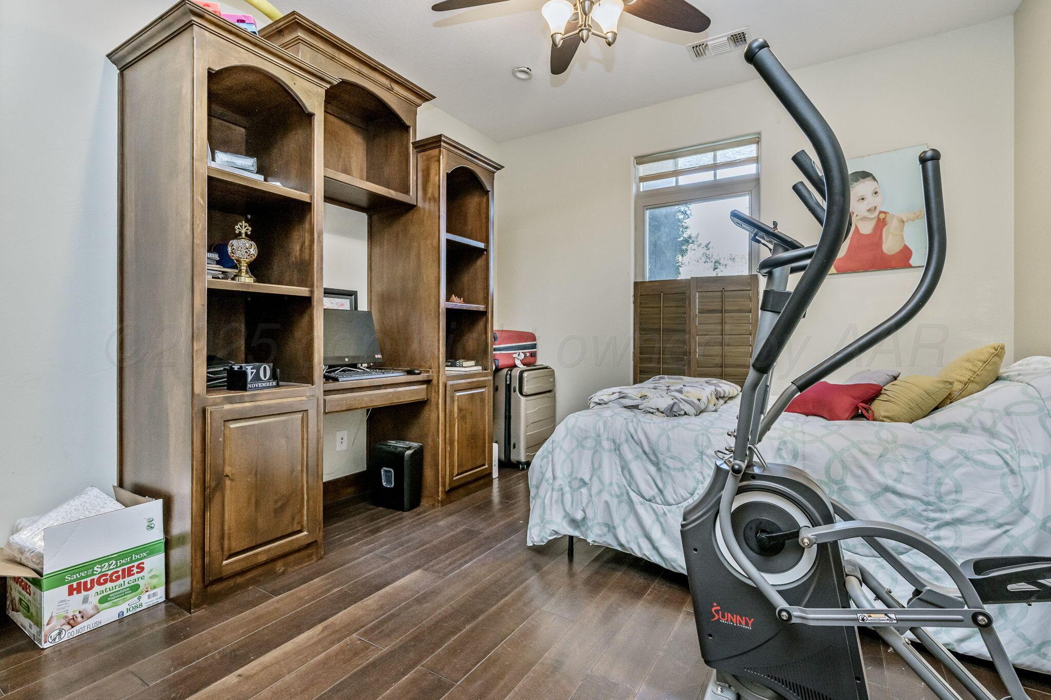 101 Pheasant Run Canyon, TX 79015 - Photo 7 of 39 a view of livingroom with furniture and wooden floor