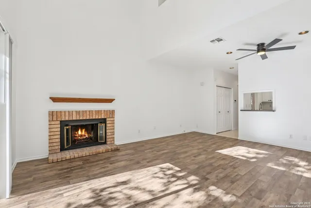 a view of a livingroom with wooden floor