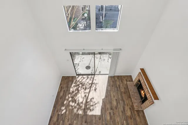 a view of backyard with a patio