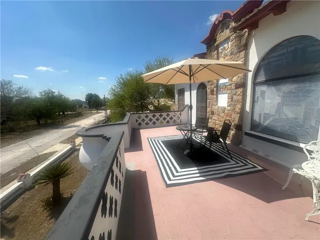 a view of outdoor space with seating area