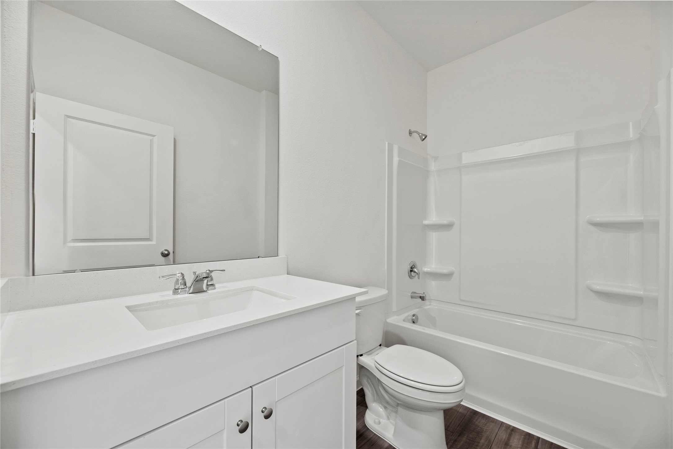 18829 Lucas Michael Way New Caney, TX 77357 - Photo 12 of 40 a bathroom with a sink toilet and shower