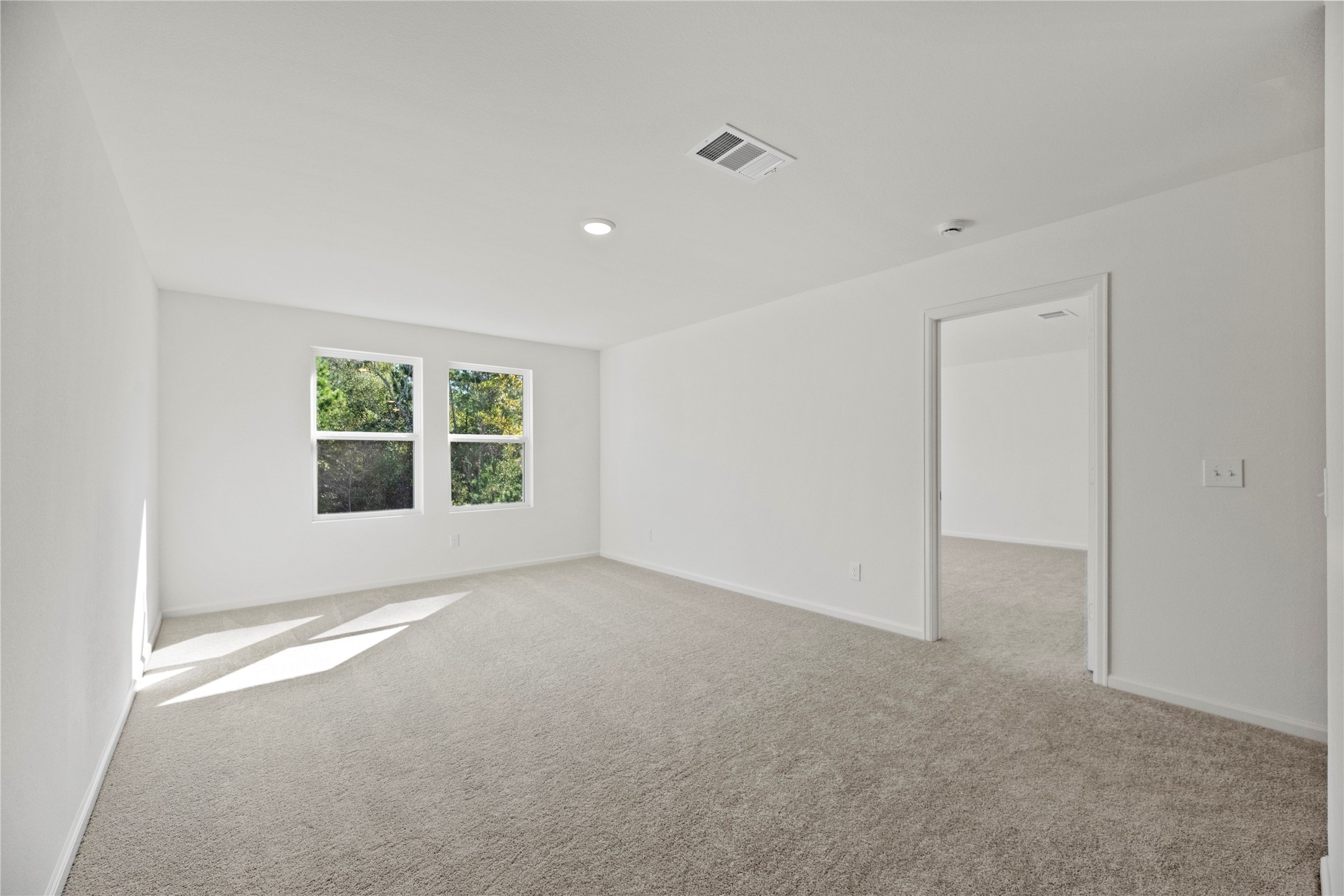 18829 Lucas Michael Way New Caney, TX 77357 - Photo 27 of 40 an empty room with windows