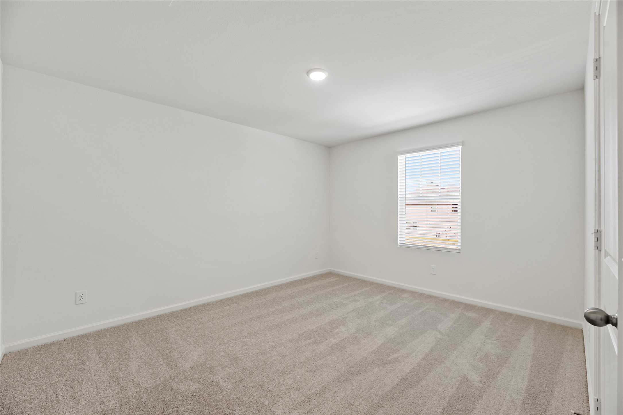 18829 Lucas Michael Way New Caney, TX 77357 - Photo 33 of 40 an empty room with a window