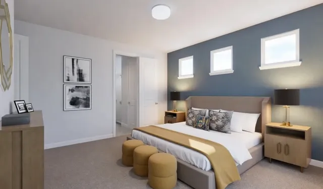 a bedroom with a bed and a night stand