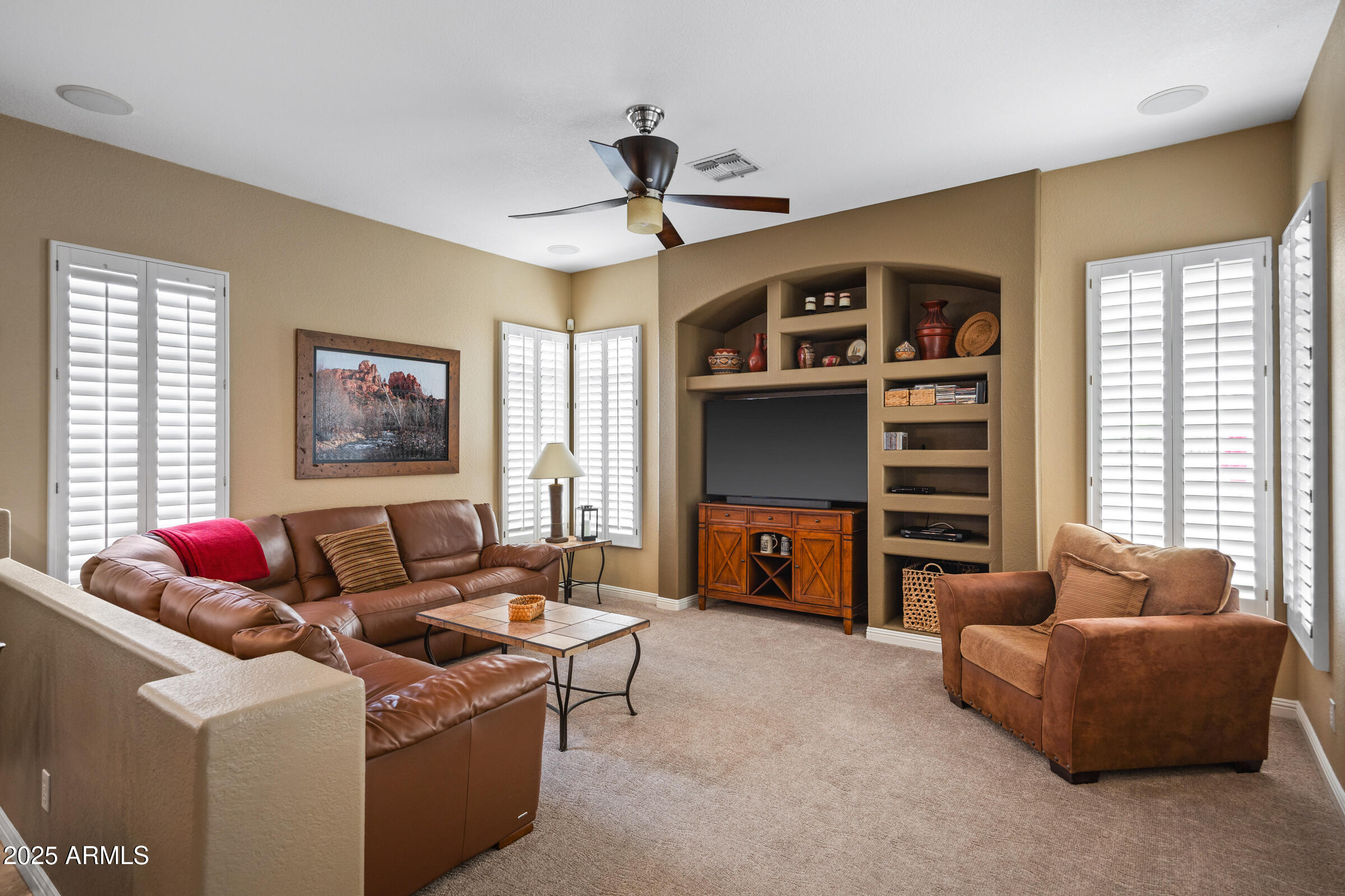 269 West El Freda Road Tempe, AZ 85284 - Photo 12 of 54 a living room with furniture and a flat screen tv
