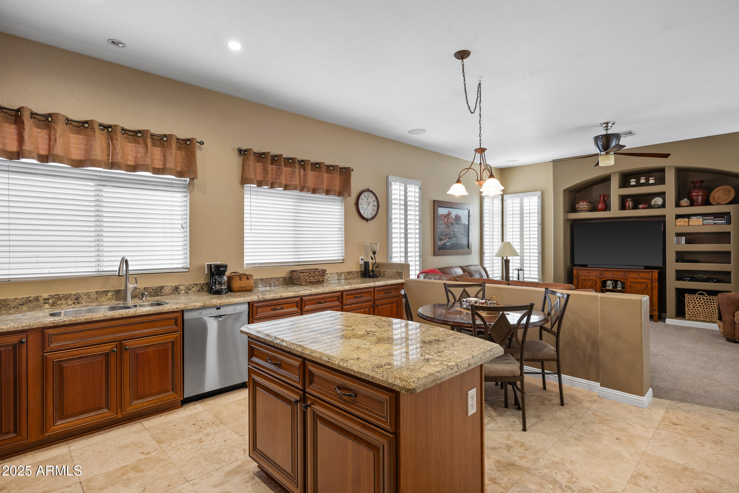 269 West El Freda Road Tempe, AZ 85284 - Photo 16 of 54 a kitchen with center island table and chairs