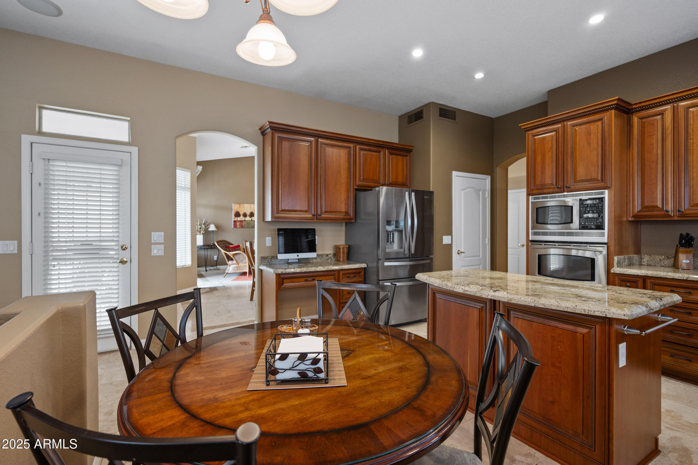 269 West El Freda Road Tempe, AZ 85284 - Photo 19 of 54 a dining room with furniture a rug and wooden floor