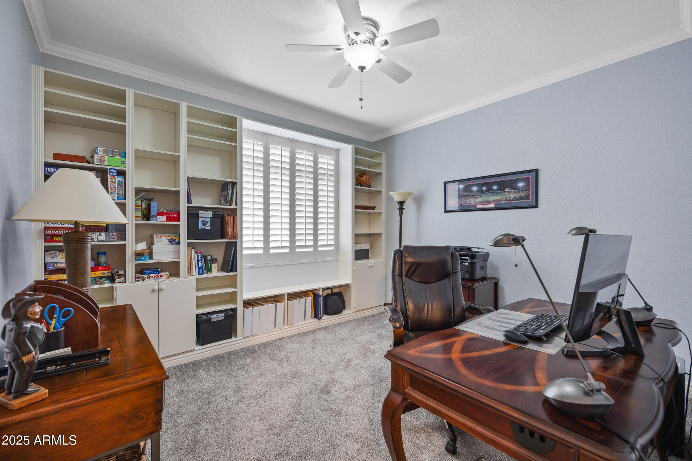 269 West El Freda Road Tempe, AZ 85284 - Photo 22 of 54 a view of a workspace with furniture and a window