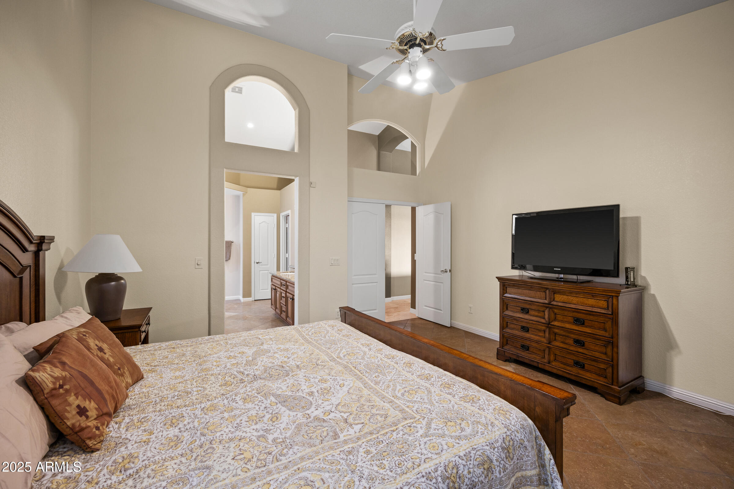 269 West El Freda Road Tempe, AZ 85284 - Photo 28 of 54 a bedroom with a bed and a flat screen tv