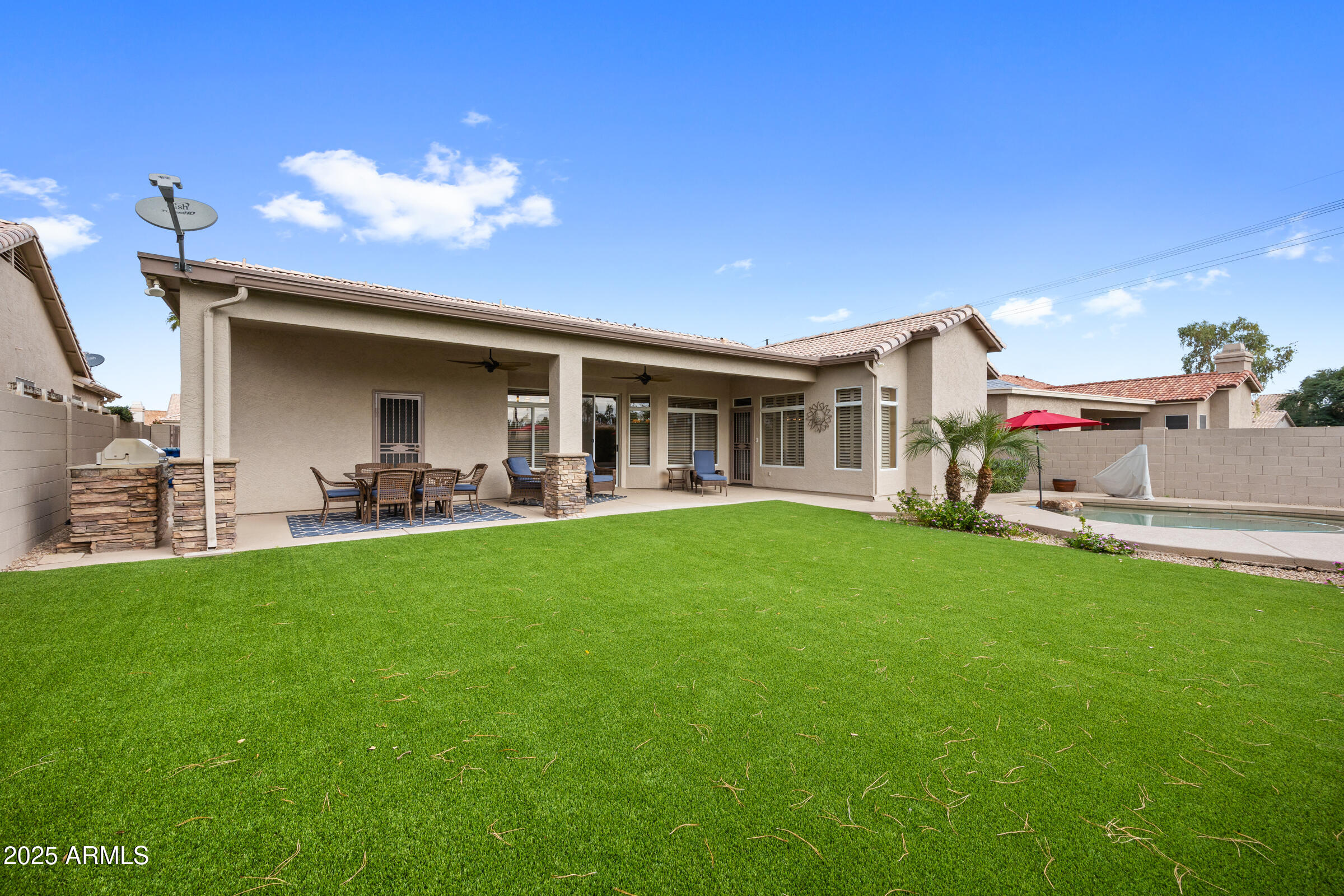 269 West El Freda Road Tempe, AZ 85284 - Photo 34 of 54 a view of a house with a yard