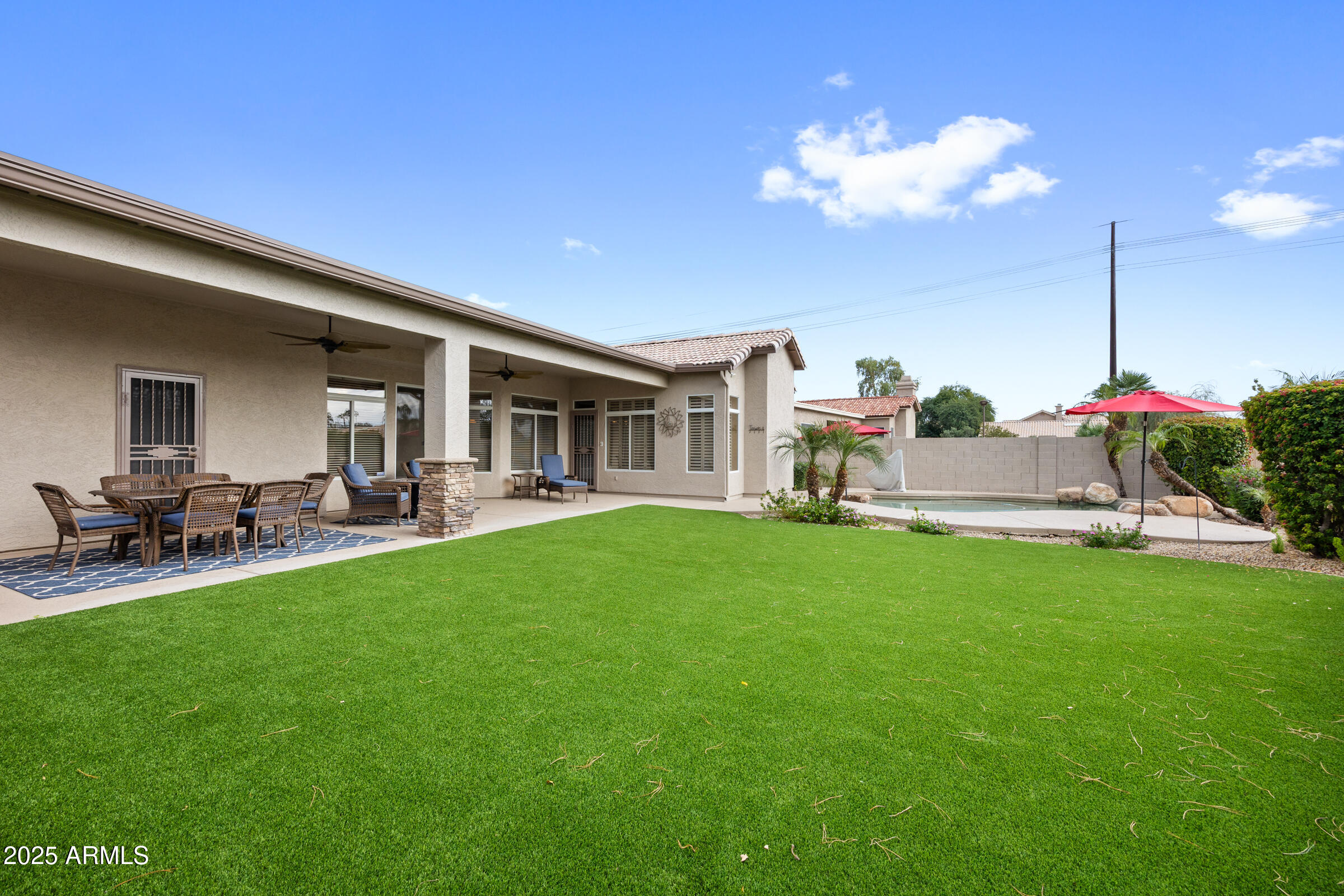 269 West El Freda Road Tempe, AZ 85284 - Photo 35 of 54 a view of a house with backyard porch and sitting area