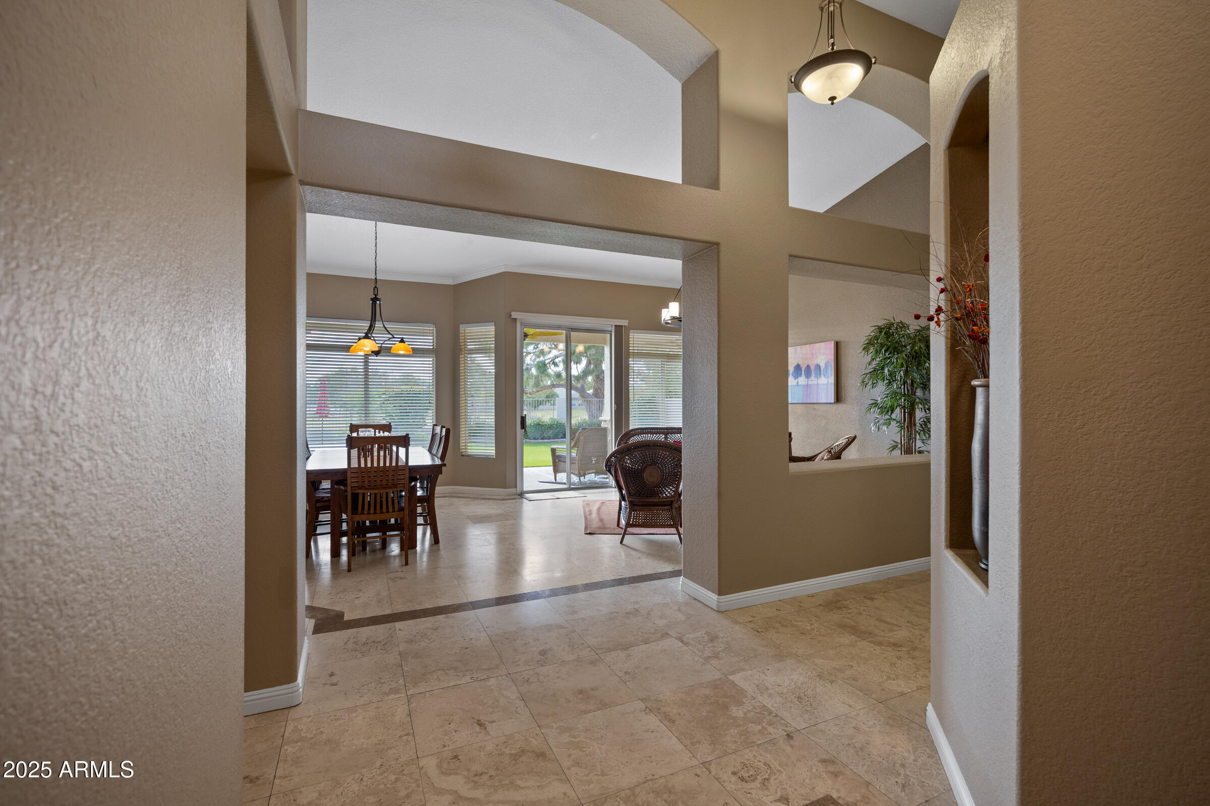 269 West El Freda Road Tempe, AZ 85284 - Photo 5 of 54 a view of a dining room with furniture and a window
