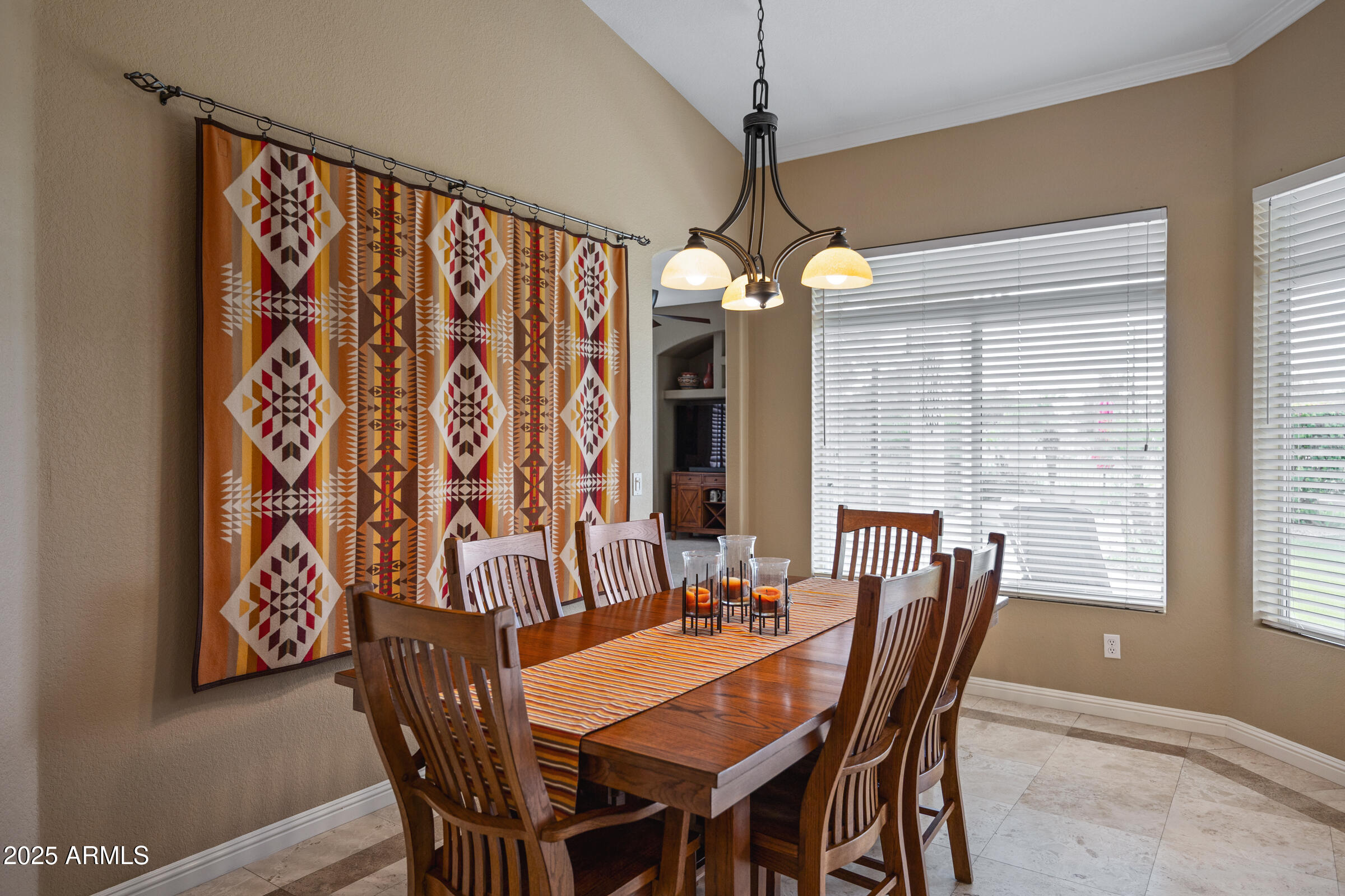 269 West El Freda Road Tempe, AZ 85284 - Photo 10 of 54 a view of a dining room with furniture window and wooden floor